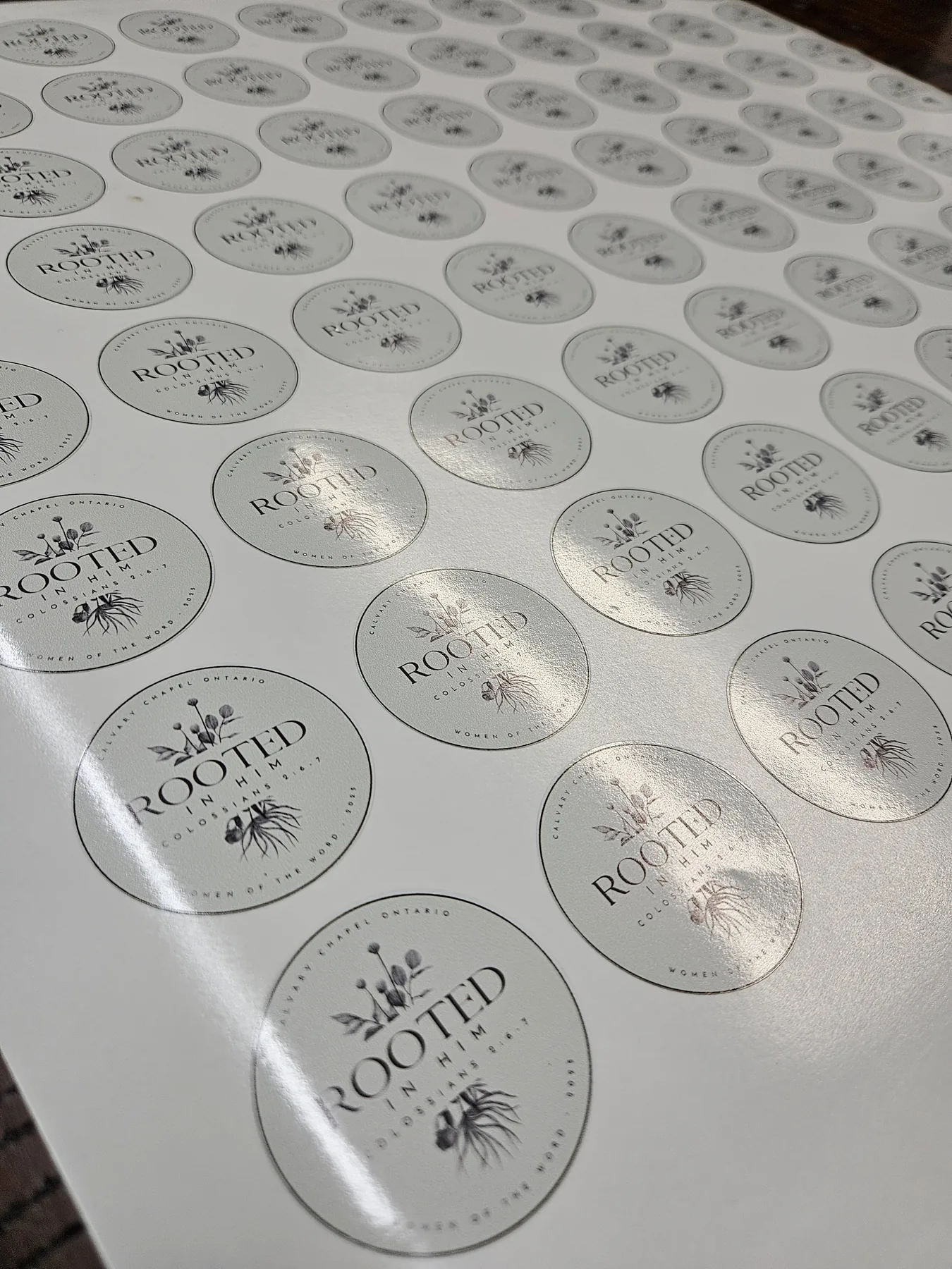 Sheets of custom round logo stickers